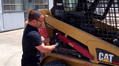 manually raising skid steer arms|cat skid steer loader lift arms.